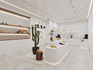 现代服饰鞋店 前台 中岛展台 布艺沙发 仙人掌